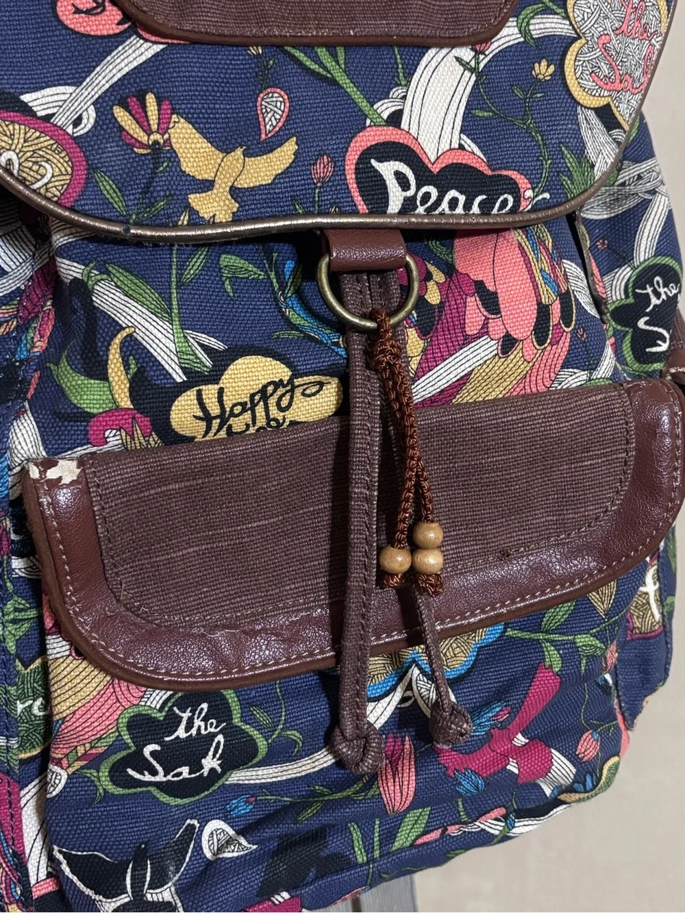 Sakroots Artist Circle Peace Canvas Flap Drawstring Backpack Boho Hippie Blue